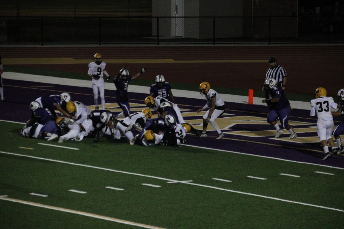 The Vikings celebrate as Nuñez scores the team's only touchdown of the game.